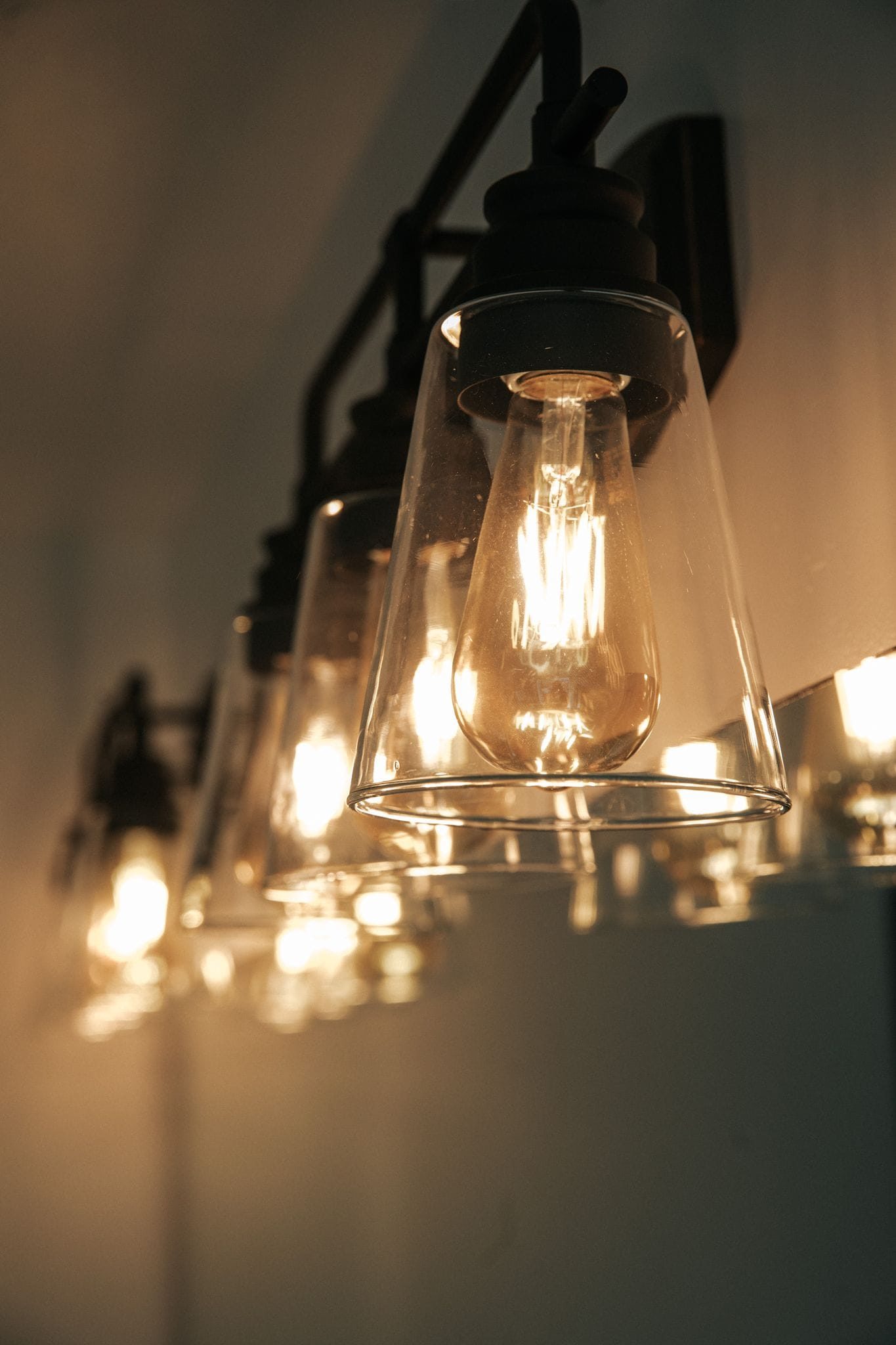 Edison bulb light fixture over a mirror