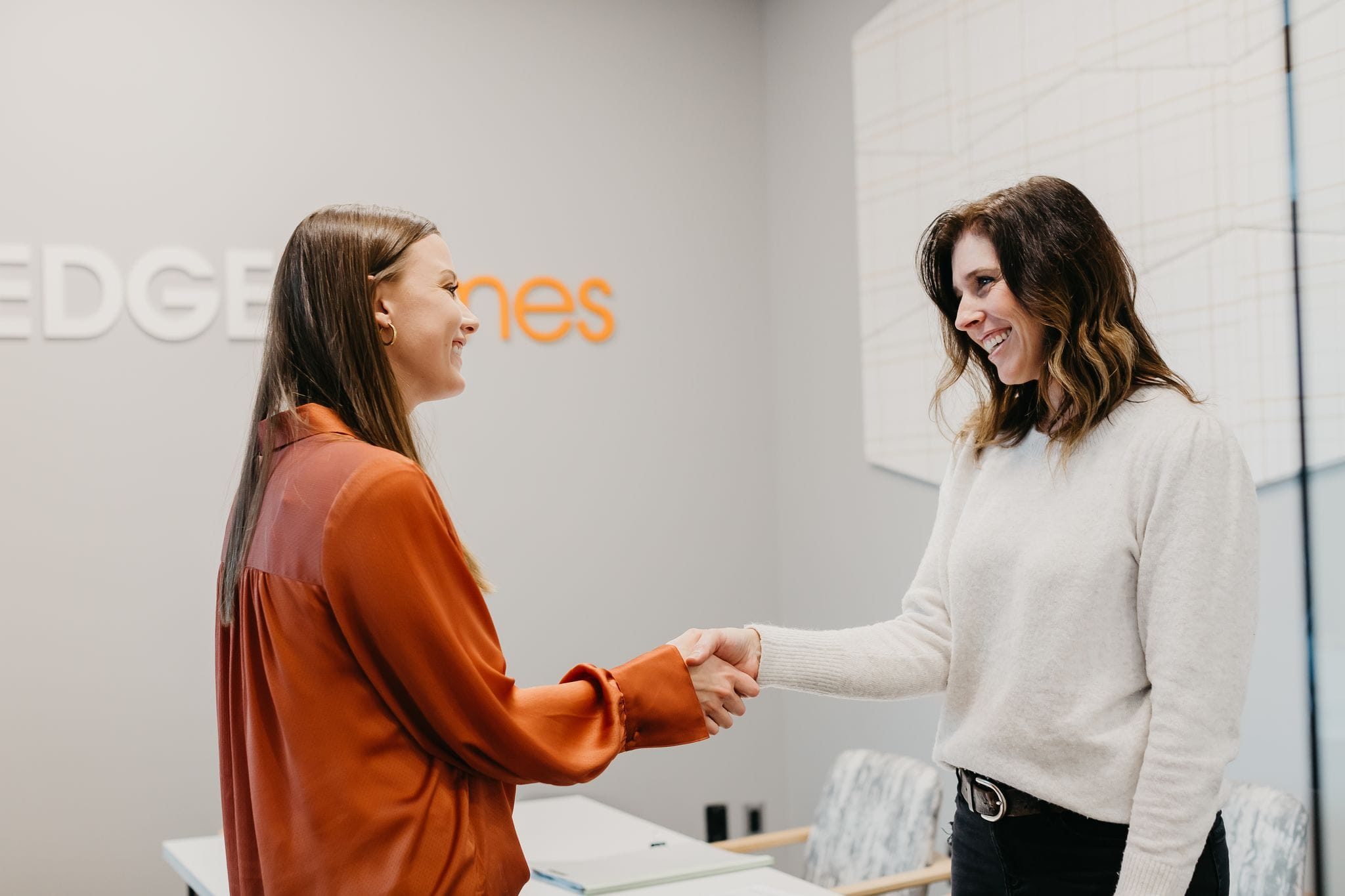 EDGEhomes agent shaking hands with home buyer