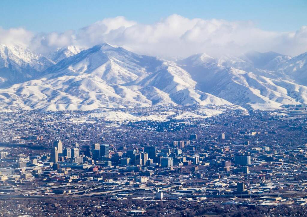 Salt Lake City in front of a snowy mountain front