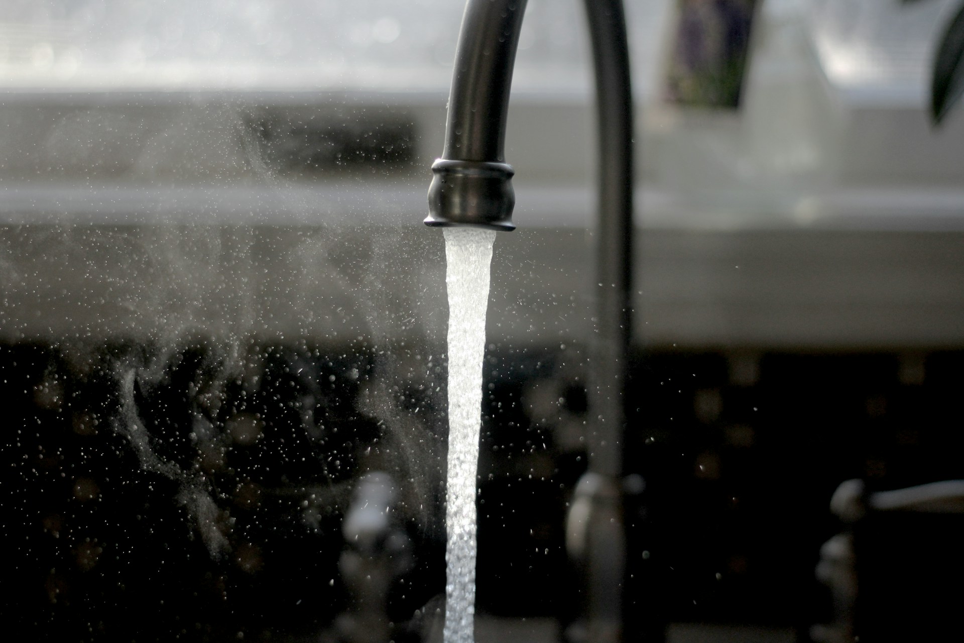 A faucet running hot water after de-winterizing a home
